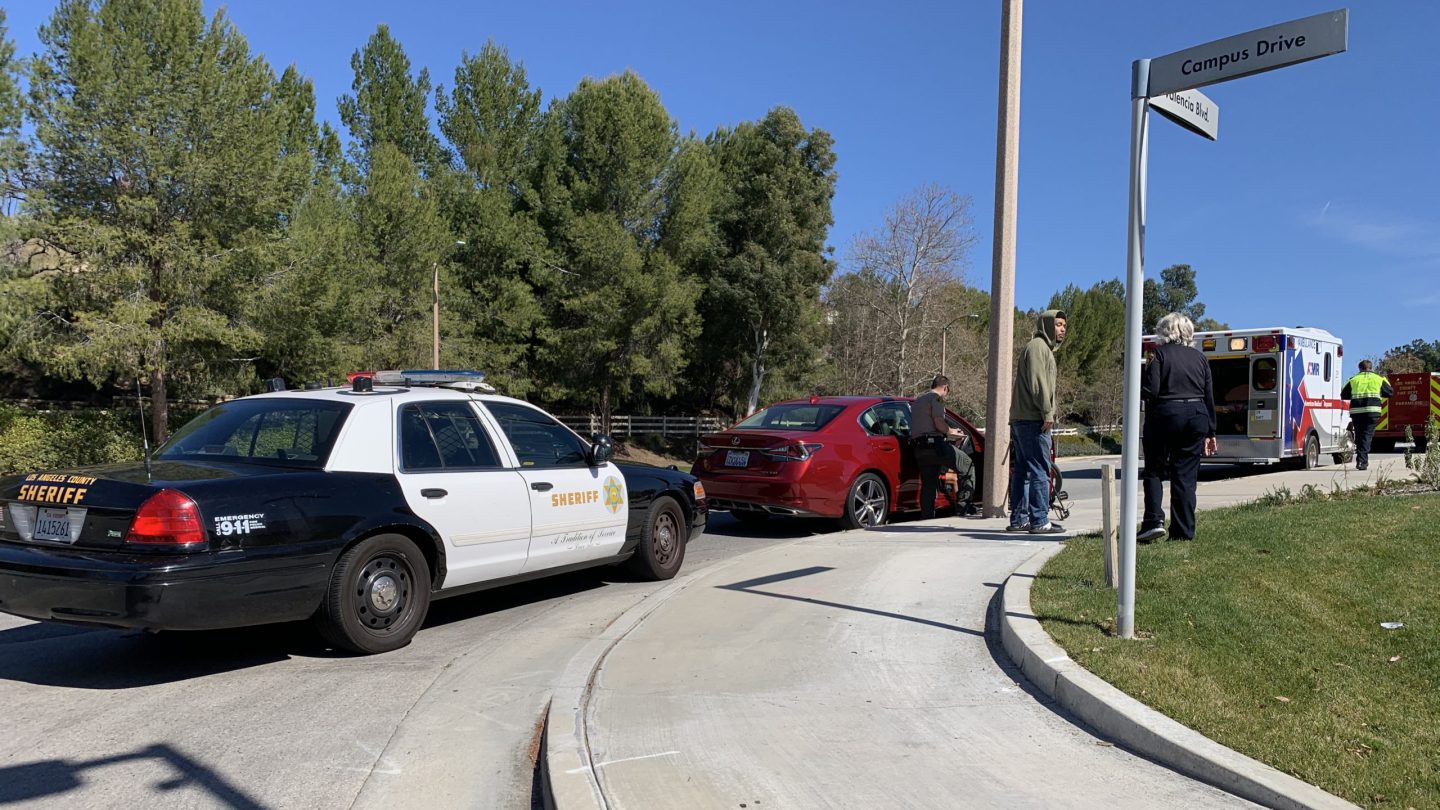 Car hits cyclist near Lot 7