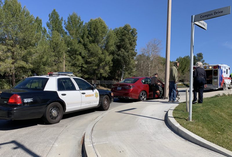 Car hits cyclist near Lot 7